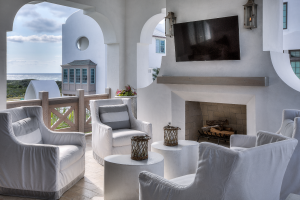 30A Florida beach house outdoor den with fireplace and fire pit