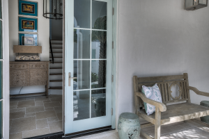 30A Florida beach house outdoor foyer with unique bench