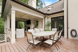 Outdoor porch dining in elegant Buckhead Atlanta home.